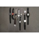 A selection of wristwatches, including a gentleman's Avia automatic wristwatch, a Mao waving hand