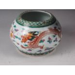 A Chinese famille verte bulbous vase with polychrome dragon and cloud decoration, four character