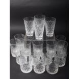 A set of four Waterford crystal tapered glasses, seven Webb tumblers and seven other tumblers