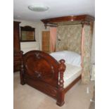 A late Victorian figured mahogany half tester bed with panelled footboard and Kate Greenaway