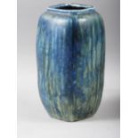 A stoneware square-section vase with blue mottled glaze, inscribed "R W Martin & Bros Southall" to