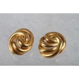 A pair of yellow metal spiral ear clips, stamped 18K, 39.7g