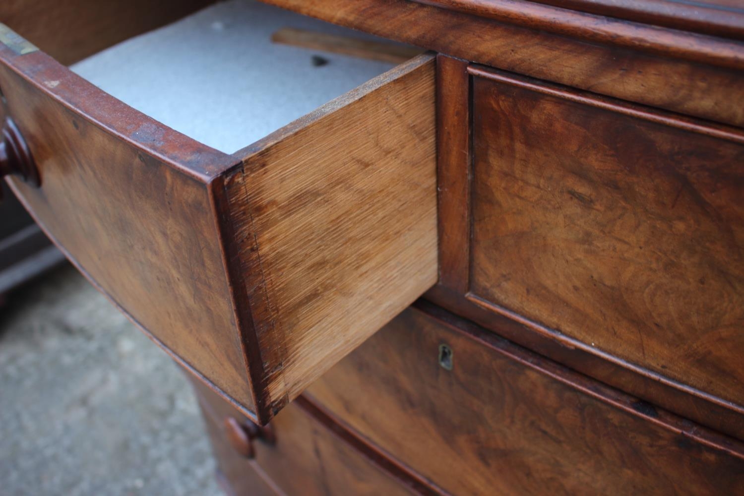 A 19th century figured mahogany bowfront chest of two short and three long graduated drawers with - Image 2 of 4