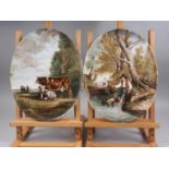 A pair of painted oval porcelain panels, decorated landscapes with cows and figures, 15 3/4" x 12