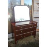 An Edwardian mahogany dressing chest with mirror over two short and two long drawers, on square