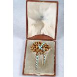 A Victorian yellow metal and turquoise set memento brooch with inset woven hair verso, in original