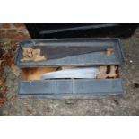 A cabinet maker's portable tool case with drop front and three drawers, containing, drill and