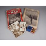 A quantity of "The War" magazines, assorted postcards, two decks of playing cards and