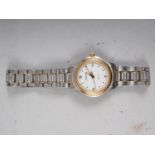 A lady's Tissot stainless steel bracelet watch with white enamel dial