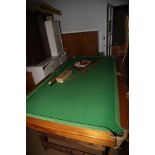 A "Boliden Punter Six De Luxe" slate bed snooker table, on folding stand, with cues and accessories,