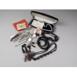 Two pairs of jet clip-on earrings, a quantity of mourning jewellery, a pearl necklace, in box, a