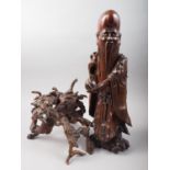 A Chinese carved fruitwood figure of a Laotsu, on root stand, 26 1/2" high overall
