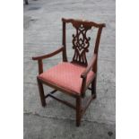 A George III provincial mahogany side chair of Chippendale design with pierced splat back and drop-