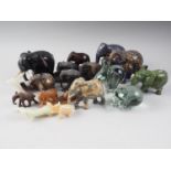 A quantity of model elephants and carved hardstone model animals