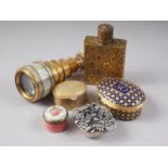 A miniature basket, stamped 925, 0.6oz troy, a Schiaparelli gilt metal cased scent bottle, a