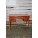 An Edwardian mahogany and satinwood banded bowfront desk, fitted two shallow and two deep drawers,