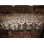 A set of eight Webb Corbett cut crystal wines, seven smaller wines and other matching glasses