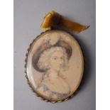 A late 18th century watercolour portrait miniature of an unknown woman with pearl necklace, 2 1/2" x