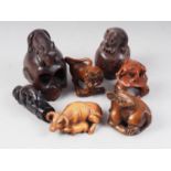 A carved boxwood netsuke water buffalo and calf, four carved hardwood rat netsuke and two others