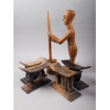 Four African hardwood Ashanti "stools", tallest 3 1/2" high, and an African carved hardwood