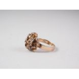 A yellow metal "rose gold" nugget ring, 10g