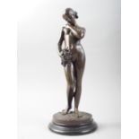 After Charles Cumberworth: a patinated bronze of Venus with a snake and flowers, 12 1/4" overall