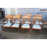 A set of eight 19th century mahogany bar back dining chairs with drop-in seats, on turned