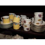 A Royal Worcester "Evesham" pattern part teaset, six matching ramekins, and a Villeroy & Boch "