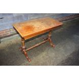 A 19th century figured walnut quartered top fold-over top card table, on turned and carved splay