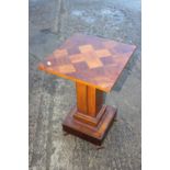 An Art Deco walnut parquetry square top occasional table, on splay supports, 15" square x 23" high