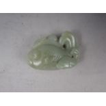 A Chinese carved jade fish, 2 1/2" wide