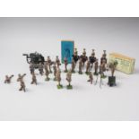 A collection of early 20th century Britains painted lead soldiers (30 approx) and a field gun