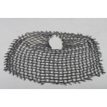 Tam Vijipan, 1994: a chain mesh collar, 13" dia