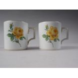 A pair of Meissen mugs, decorated with yellow roses, 3 1/2" high