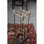 A brass stick stand, 8 1/2" square (no drip tray)