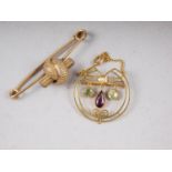 A 19th century yellow metal bar brooch, 3.6g, and a 9ct gold, garnet, seed pearl and peridot