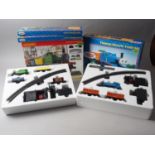 A Hornby 00 Gauge Local Freight Train set, boxed, a Thomas & Friends "Thomas Electric Train" set and