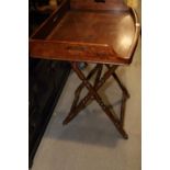 A butler's 19th century mahogany bowfront tray, on folding stand, 32" wide x 22 1/2"deep x 31 1/2"