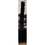 A black anodised metal bookcase, on chrome base, 14" wide x 14" deep x 84" high