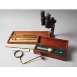 A Harling of London cartographers rule, boxed, a hydrometer, boxed, two rules and a Leitz Wetzlar