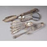 A set of five silver coffee spoons, a silver plated butter knife, a pair of silver sugar tongs,