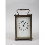 A carriage clock with white enamel dial, supplied by Stuart Dawson & Co Ltd, Hatton Garden, 4" high