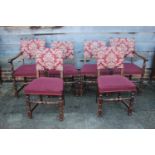 A set of six Restoration design oak framed dining chairs with padded seats and backs (4+2)