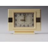 A 1930s Jaz cream plastic alarm clock, 6 1/2" high