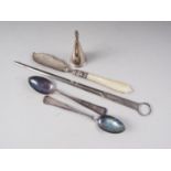 A silver candle snuffer, a silver butter knife with mother-of-pearl handle, two Continental white