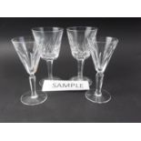 A set of eight Waterford "Lismore" pattern wine glasses and five Waterford "Sheila" pattern pedestal