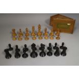 A late 19th century Jaques of London boxwood and ebony Staunton pattern chess set, boxwood king only