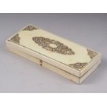 A Cantonese carved ivory glove box with central panel, decorated figures and floral corners, 8 1/
