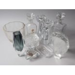 A pair of Baccarat glass candlesticks, 7" high, two Baccarat decanters, a 1930s cut glass vase and
