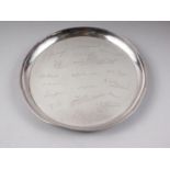 A silver presentation tray, raised on three feet, 15.8oz troy approx